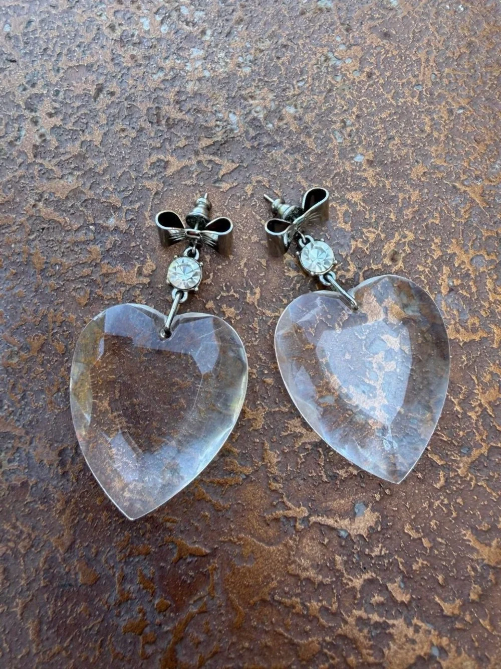 Vtg Clear acrylic diamond like heart earrings with bow and rhinestone detail